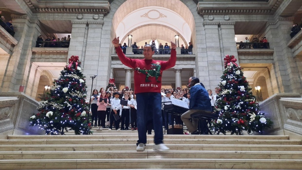 Kinew greeted attendees dressed in a bright red Christmas sweater. His message to the crowd was one of unity. (Source: Daniel Timmerman, CTV News)