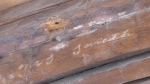 The signature in the exposed rafters spelling "My. I. Smith" at the P.E.I. Province House. (CTV/Jack Morse)