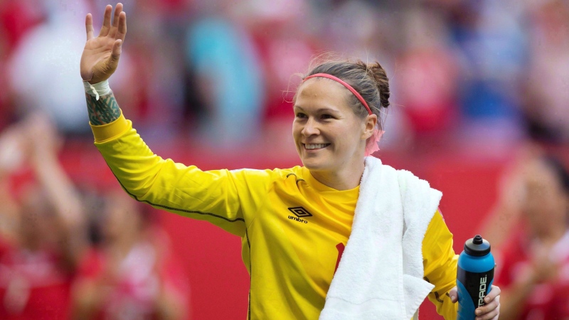 Canada goalkeeper Erin McLeod waves to fans after defeating Switzerland 1-0 in a FIFA Women's World Cup round of 16 soccer match in Vancouver on June 21, 2015. THE CANADIAN PRESS/Darryl Dyck