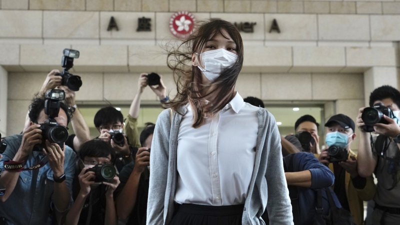 Hong Kong activist Agnes Chow arrives at a court in Hong Kong, Monday, Nov. 22. 2020. (AP Photo/Vincent Yu)