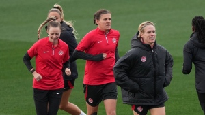 Christine Sinclair and Sophie Schmidt, longtime friends and roommates on the road, meet the media Sunday ahead of their international swansong Tuesday against Australia at B.C. Place Stadium. (THE CANADIAN PRESS/Scott Barbour)