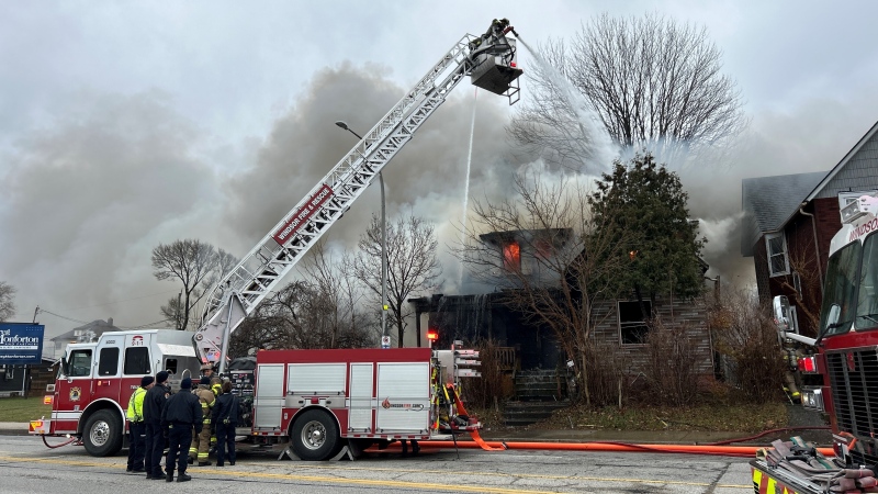 Windsor fire crews on scene of a house fire in the 600 block of Riverside Drive East in Windsor, Ont. on Monday, Dec. 4, 2023. (Travis Fortnum/CTV News Windsor)