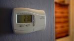 A thermostat in the house of Sharron Anderson, 60, in Plumstead, London, Thursday, Sept. 8, 2022. (AP Photo/Alberto Pezzali)