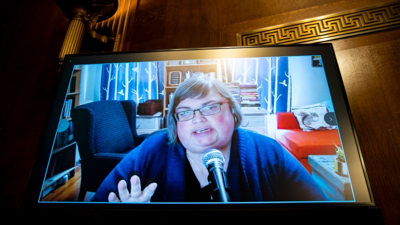 Joan Donovan, then-research director of the Shorenstein Center on Media, Politics and Public Policy, speaks remotely during a hearing of the Senate Judiciary Subcommittee on Privacy, Technology, and the Law, on Capitol Hill, April 27, 2021, in Washington. The prominent disinformation scholar who left Harvard University in August 2023 has accused the school of muzzling her speech and stifling — then dismantling — her research team as it launched a deep dive in late 2021 into a trove of Facebook files she considers the most important documents in internet history. (Al Drago/Pool Photo via AP, File)