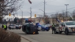 A car on its side after a crash on Bridgeport Road North in Waterloo on Dec. 4, 2023. (Source: Twitter/@TJsupercell)