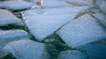 A stock photo showing broken ice on a body of water. (Pexels/@cheneymediaproductions)