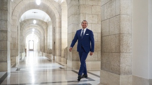 Manitoba Premier Wab Kinew, walks to the Premier's office to meet with outgoing Manitoba Premier Heather Stefanson in Winnipeg, Thursday, Oct. 5, 2023. THE CANADIAN PRESS/David Lipnowski