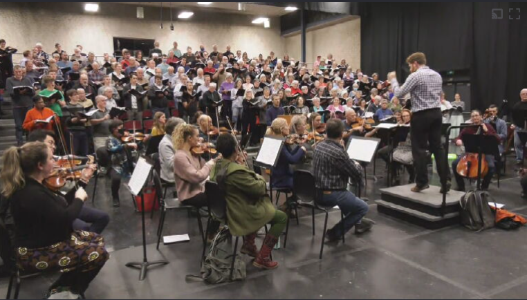 Members of the former K-W Symphony rehearse with the Mennos Singers.