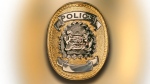 Calgary police say an officer's badge was stolen from a vehicle at the Yamnuska Trail parking lot outside of Canmore on Sunday, Dec. 3, 2023. 