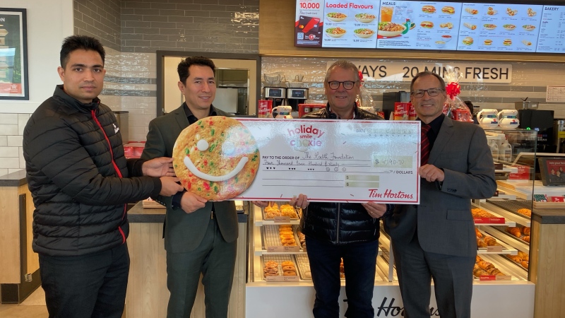 From left to right: General Manager Vishal Sharma and Owner Mauricio Gomez of Yorkton Tim Hortons presenting the donation of $4,790.70 to board member Warren Kotzer and Executive Director Ross Fisher of The Health Foundation in Yorkton. (Sierra D'Souza-Butts/CTV News)