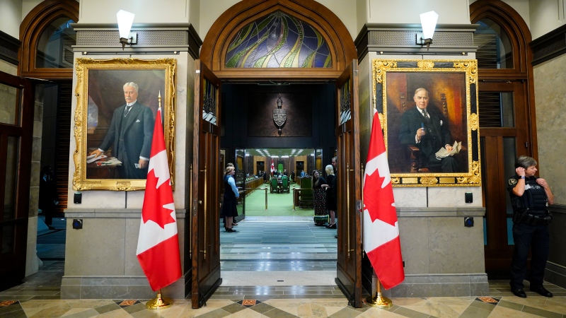 The House of Commons is pictured through the foyer doors on Parliament Hill, in Ottawa, Wednesday, Sept. 20, 2023. THE CANADIAN PRESS/Sean Kilpatrick