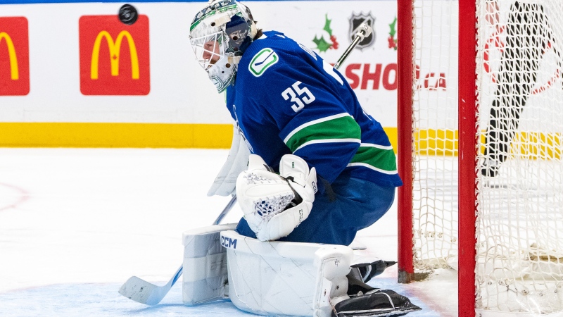 Vancouver Canucks' goaltender Thatcher Demko (35) stops the puck during the third period of an NHL game against the Florida Panthers in Vancouver on Thursday, Dec. 14, 2023. THE CANADIAN PRESS/Ethan Cairns