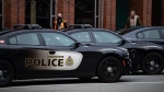 Police cars are seen parked outside Vancouver Police Department headquarters in Vancouver, on Saturday, January 9, 2021. THE CANADIAN PRESS/Darryl Dyck