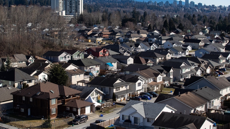 Houses are seen on Squamish Nation land in North Vancouver, on Tuesday, February 22, 2022.  THE CANADIAN PRESS/Darryl Dyck