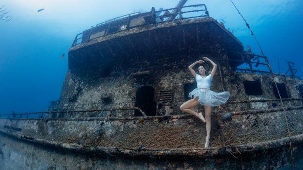 Kim Bruneau posed 40 metres underwater and broke the Guinness World Record in the Bahamas. SOURCE: Kim Bruneau