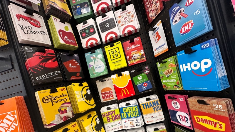 Gift cards are displayed at a Target store, in New York, Thursday, Dec. 21, 2023. Americans are expected to spend nearly US$30 billion on gift cards this holiday season, according to the National Retail Federation. Restaurant gift cards are the most popular, making up one-third of those sales. (AP Photo/Richard Drew)