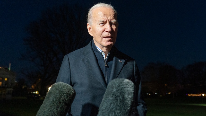U.S. President Joe Biden answers a reporter's question as he walks from Marine One upon arrival on the South Lawn of the White House, Dec. 20, 2023, in Washington. (AP Photo/Alex Brandon, File)
