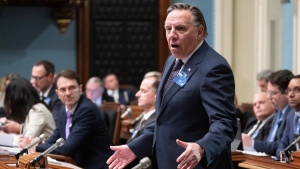 Quebec Premier Francois Legault responds to the Opposition over a grant to the L.A. Kings to commemorate and play two exhibition games in Quebec City. during question period, at the legislature in Quebec City, Tuesday, Nov. 21, 2023. THE CANADIAN PRESS/Jacques Boissinot