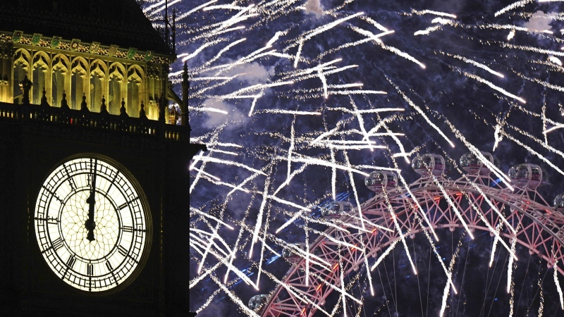 Fireworks light up the sky over Elizabeth Tower, also known as Big Ben and the London Eye, in central London during New Year celebrations on Monday, Jan. 1, 2024. (Aaron Chown/PA via AP)