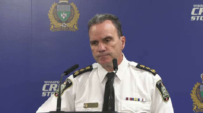 Winnipeg Police Chief Danny Smyth answers questions during a news conference on Jan. 1, 2024.