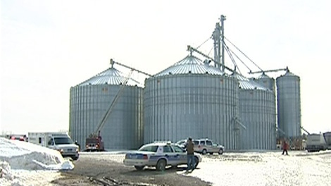 Rescue crews try to save an Ottawa man trapped in a corn silo in North Gower, Wednesday, March 3, 2010.
