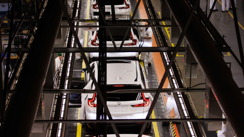 A general view of production along the production line is shown during a tour of a Honda manufacturing plant in Alliston, Ont., Wednesday, Apr. 5, 2023. Japanese automaker Honda says it will start producing the Civic Hybrid next year at its plant in Alliston, Ont.THE CANADIAN PRESS/Cole Burston