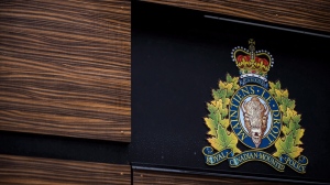 The RCMP's Quebec detachment says it has sent investigators to determine whether a stabbing at a restaurant north of Quebec City before Christmas was an act of terrorism. The RCMP logo is seen outside Royal Canadian Mounted Police "E" Division Headquarters, in Surrey, B.C., on April 13, 2018. THE CANADIAN PRESS/Darryl Dyck