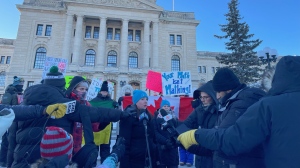 Saskatchewan Teachers Federation President Samantha Becotte speaks to reporters outside the legislature on Jan. 16, 2023. (Katy Syrota/CTV News)