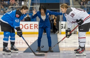 Toronto Mayor Olivia Chow does the ceremonial puck drop with Toronto forward Blayre Turnbull, right, and Ottawa forward Brianne Jenner prior to PWHL action in Toronto on Saturday January 13, 2024. (Frank Gunn/THE CANADIAN PRESS)