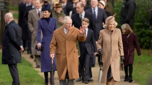 Britain's King Charles III, Queen Camilla, Kate, the Princess of Wales, Prince George, William, the Prince of Wales, Prince Louis and Mia Tindall arrive to attend the Christmas day service at St Mary Magdalene Church in Sandringham in Norfolk, England, Monday, Dec. 25, 2023.(AP Photo/Kin Cheung)