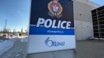 The sign outside Ottawa Police headquarters on Elgin St. is seen in winter. (CTV News Ottawa) 