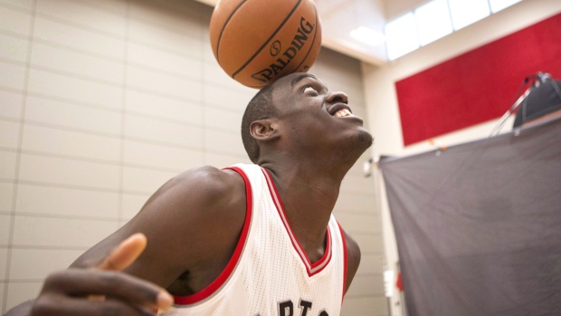 Toronto Raptors' Pascal Siakam balances a ball on his head during a media day for the team in Toronto on Monday September 26, 2016. (THE CANADIAN PRESS/Chris Young)