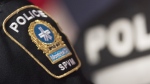 A Montreal police badge is shown during a news conference in Montreal, Monday, Oct. 7, 2019. (THE CANADIAN PRESS/Graham Hughes)