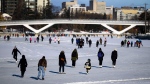 People skate on the Rideau Canal Skateway on its opening day in Ottawa, on Sunday, Jan. 21, 2024. Skaters flocked to the ice, one year after warm and wet weather prevented the 7.8 kilometre skateway from opening for its 2023 season. (Justin Tang/THE CANADIAN PRESS)

