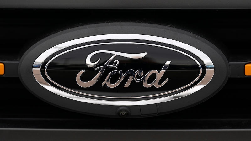 The Ford company logo is seen outside a dealership Sunday, Jan. 21, 2024, in Broomfield, Colo. (AP Photo/David Zalubowski)