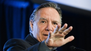 Quebec Premier and leader of the Coalition Avenir Quebec Francois Legault speaks at the party's youth convention in Saint-Jean-sur-Richelieu, Que., Saturday, September 9, 2023. THE CANADIAN PRESS/Graham Hughes