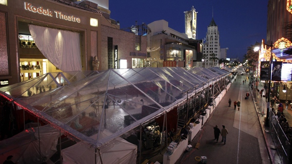 The red carpet running along Hollywood Blvd. outside the Kodak Theatre is covered with a protective tent in preparation for the 82nd Academy Awards in Los Angeles, Calif., on Thursday, March 4, 2010. (AP / Amy Sancetta)