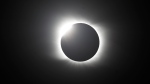 The moon covers the sun during a total solar eclipse in Piedra del Aguila, Argentina, Monday, Dec. 14, 2020. The total solar eclipse was visible from the northern Patagonia region of Argentina and from Araucania in Chile, and as a partial eclipse from the lower two-thirds of South America. (AP Photo/Natacha Pisarenko)