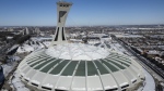 An aerial view of Olympic Stadium in Montreal, Monday Feb. 5, 2024. The Quebec government announced the roof and support ring will be replaced at a cost of $870 million. THE CANADIAN PRESS/Christinne Muschi