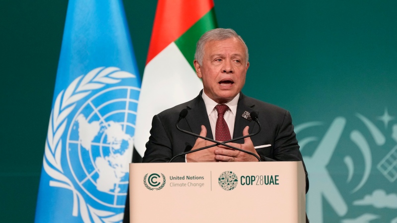 Jordan King Abdullah II speaks during a plenary session at the COP28 U.N. Climate Summit, Friday, Dec. 1, 2023, in Dubai, United Arab Emirates. (AP Photo/Peter Dejong)