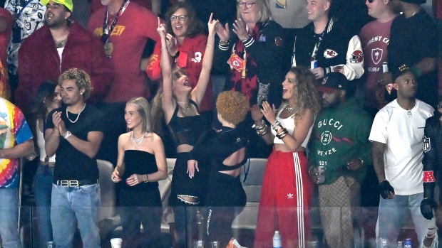 Ashley Avignone, Taylor Swift, Ice Spice and Blake Lively react during the second half of the NFL Super Bowl 58 football game between the San Francisco 49ers and the Kansas City Chiefs on Sunday, Feb. 11, 2024, in Las Vegas. Donna Kelce claps behind them. (AP Photo/David Becker)