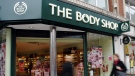 Pedestrians pass a Body Shop cosmetics store in London's Oxford Street Friday March 17, 2006. (AP Photo/Rachel Miller)