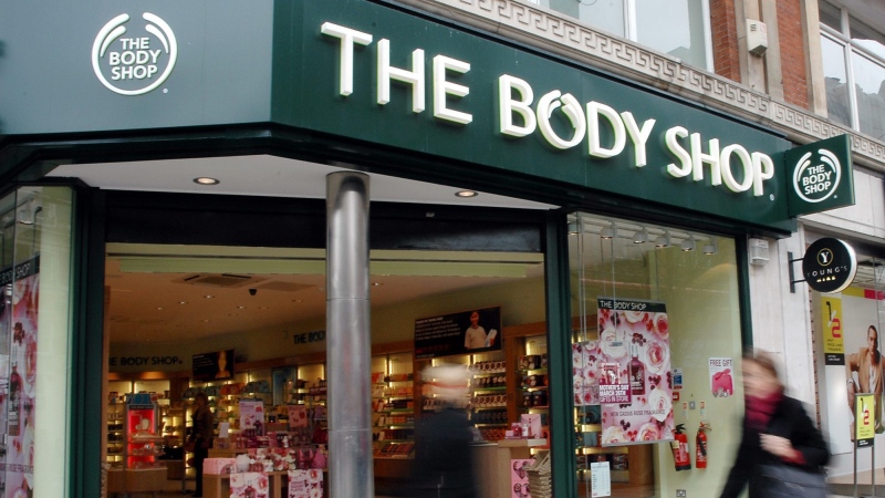 Pedestrians pass a Body Shop cosmetics store in London's Oxford Street Friday March 17, 2006. (AP Photo/Rachel Miller)