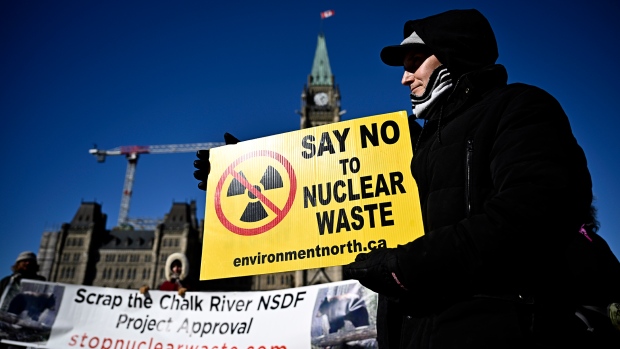 People participate in a rally against the Near Surface Disposal Facility (NSDF) project at the Canadian Nuclear Laboratories Chalk River site, on Parliament Hill in Ottawa, on Wednesday, Feb. 14, 2024. (Justin Tang/THE CANADIAN PRESS)