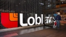 The House of Commons committee studying food prices is urging Loblaw and Walmart to sign on to the grocery code of conduct or risk having it made law. The Loblaws flagship location on Carlton Street in Toronto on Thursday May 2, 2013. (THE CANADIAN PRESS/Aaron Vincent Elkaim)