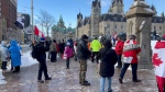 Hundreds marched through downtown to mark the second anniversary of the police removal of protestors from Parliament Hill on Saturday, Feb. 17, 2024 (Katelyn Wilson/ CTV News)
