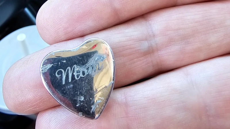 The front side of a pendant found in the parking lot of the Shawnessy Sobeys on Feb. 18. (Courtesy: Christine Wildman)