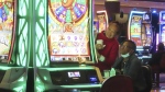 Gamblers play slot machines at Harrah's casino in Atlantic City, N.J. on Sept. 29, 2023. (AP Photo/Wayne Parry)
