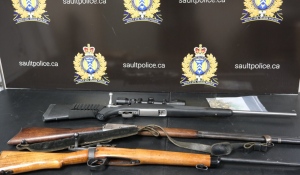 Police executed the search warrant around 4:20 p.m. and found 116 rounds of ammunition, a long gun, three different rifles, a sawed-off shotgun and a double-barrel shotgun. (Photo courtesy of the Sault Ste. Marie Police Service)