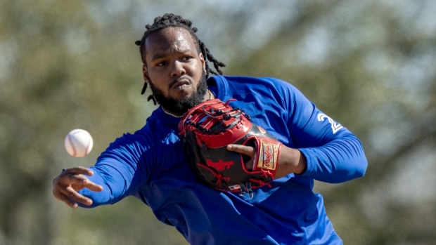Toronto Blue Jays Vladimir Guerrero Jr. throws a ball in a drill during Spring Training action in Dunedin, Fla. on Monday Feb. 19, 2024. Position players have arrived at the Blue Jays’ camp as spring training continues ahead of Saturday’s pre-season opener. THE CANADIAN PRESS/Frank Gunn